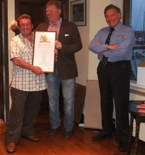 John Pearson received his Certificate of Service from Coxswain tom Clark